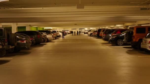 Underground parking garage with lots of cars — Stock Video