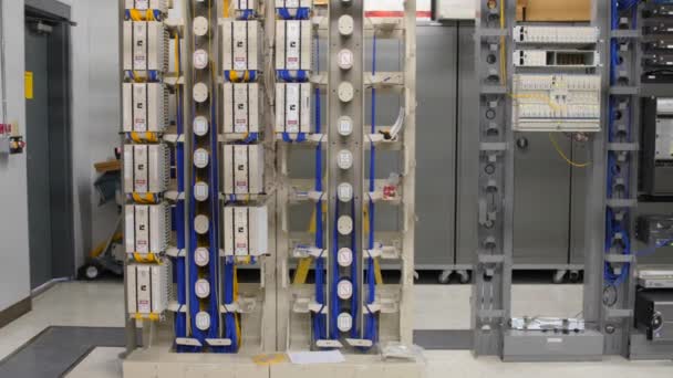 Servers inside a fiber optic telecommunications room — Stock Video