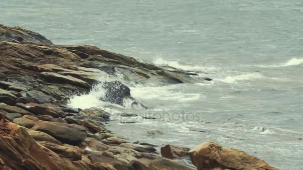 Rocky beach and the rough ocean water — Stock Video