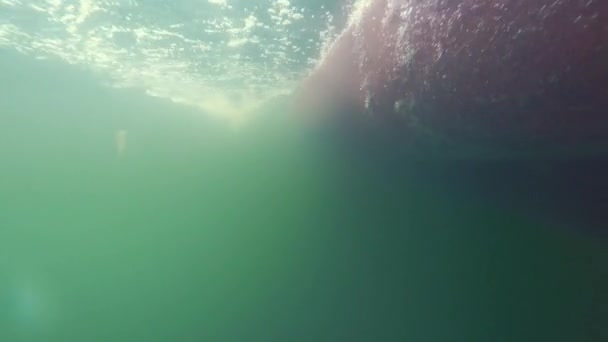 Bubbles passing by on the bottom of boat — Stock Video