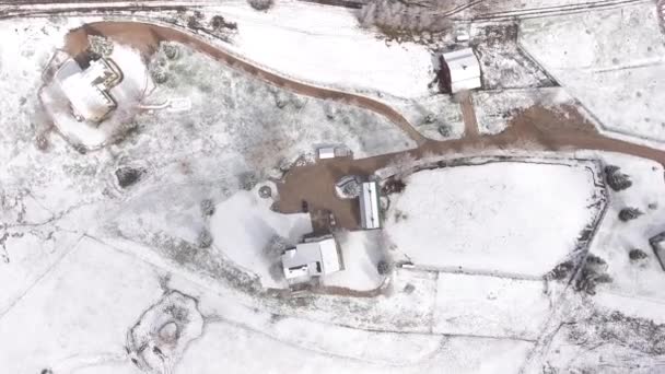Drone landing at a house in winter — Stock Video