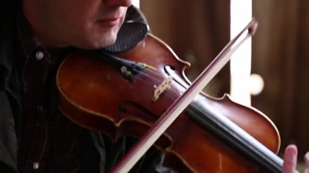 Cowboy playing fiddle — Stock Video