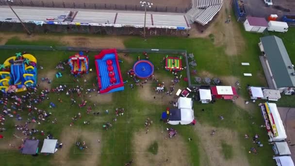 Families At A Rural Fair With Rides — Stock Video