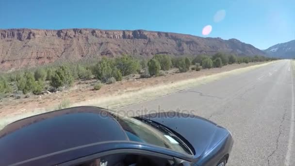 Car driving through desert in Utah — Stock Video