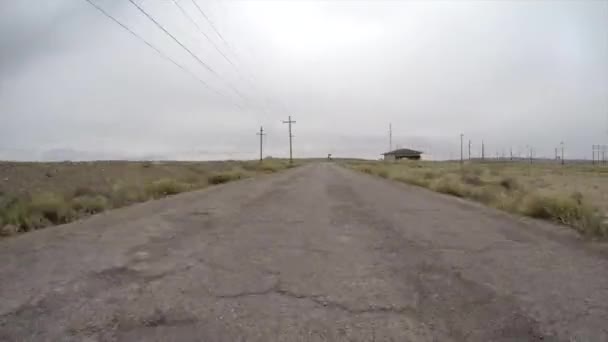 Timelapse of a car driving on dirt road — Stock Video