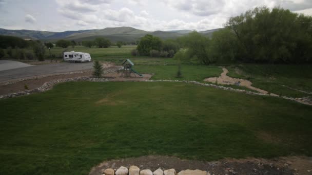 Timelapse of a man mowing the lawn — Stock Video