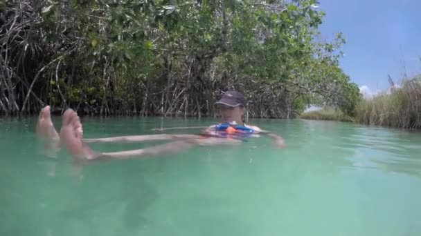 Woman Floating Ancient Mayan Canal — Stock Video