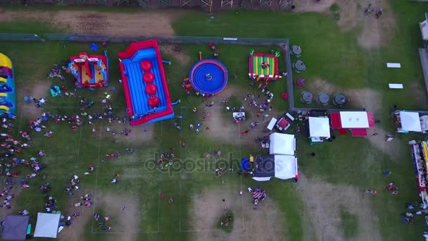 Aerial High Shot Families Having Fun Rural Fair Rides — Stock Video