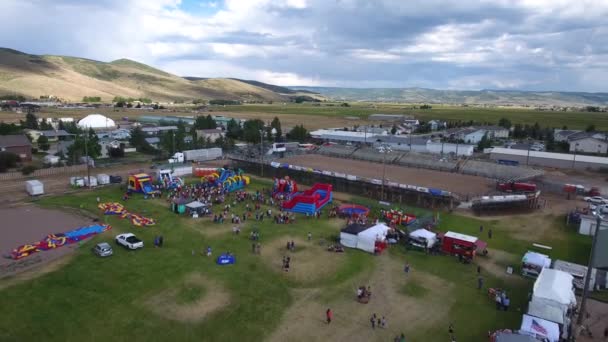Aerial High Shot Families Having Fun Rural Fair Rides Activities — Stock Video
