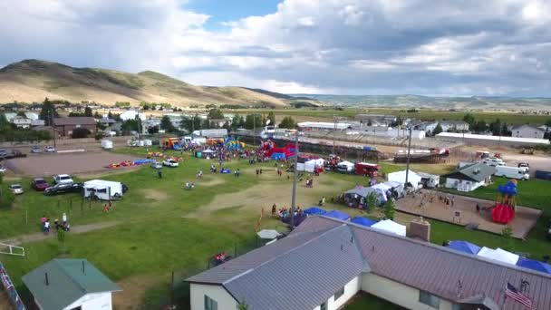 Aerial High Shot People Having Fun Rural Fair Rides Activities — Stock Video