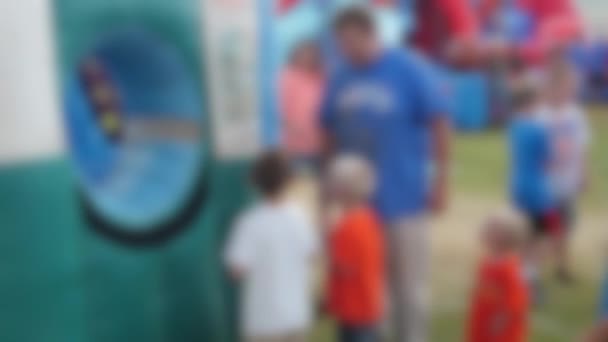 Family Play Rural Fair Rides Activities Blurred — Stock Video