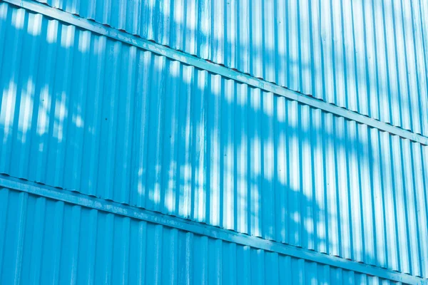 La figura azul de textura corrugada. Concepto: confiable, abstracto, creativo, arte, valla . — Foto de Stock