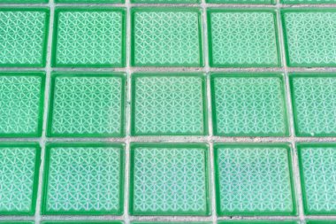 Dekoratif ve parlak cam blok pencere bir doku olarak veya arka plan için. Duvara. Geometrik arka plan.