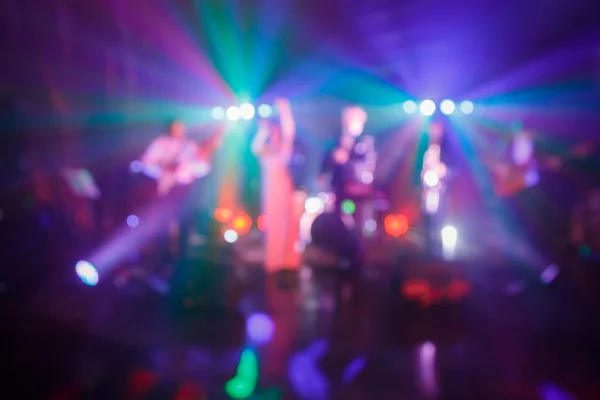 Cover band plays at the event. Blurred photo. Abstraction