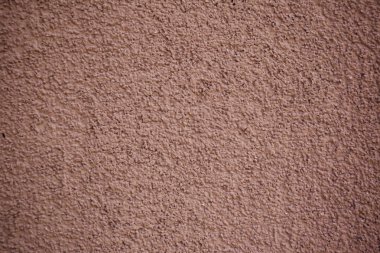 Koyu kahverengi duvar sıva arka plan doku. Renk alçı