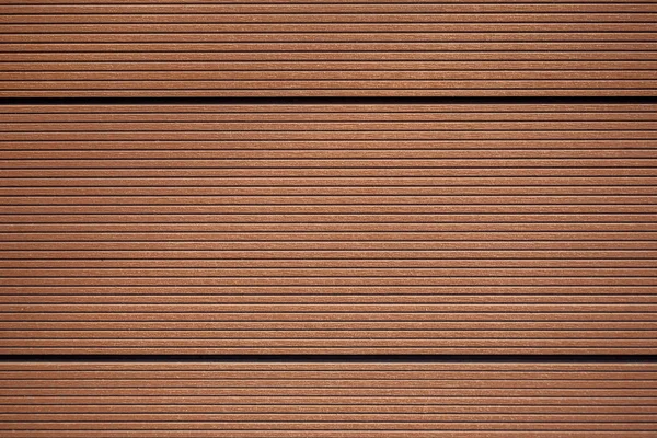 Brown ceramic panels with lots of stripes. Abstract texture Royalty Free Stock Images