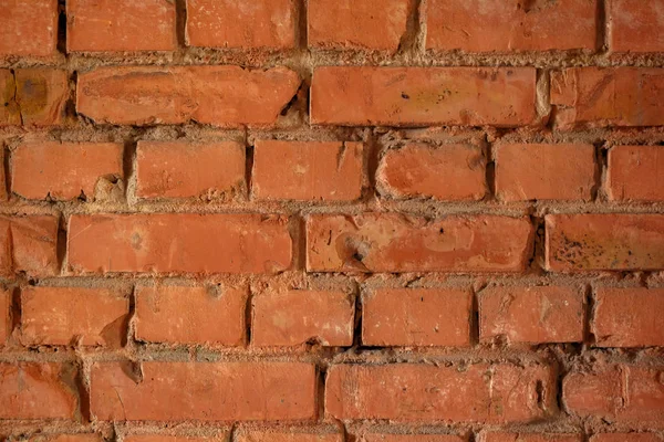 Parte de uma parede de tijolos vermelhos. Textura de fundo. Padrão Imagens Royalty-Free