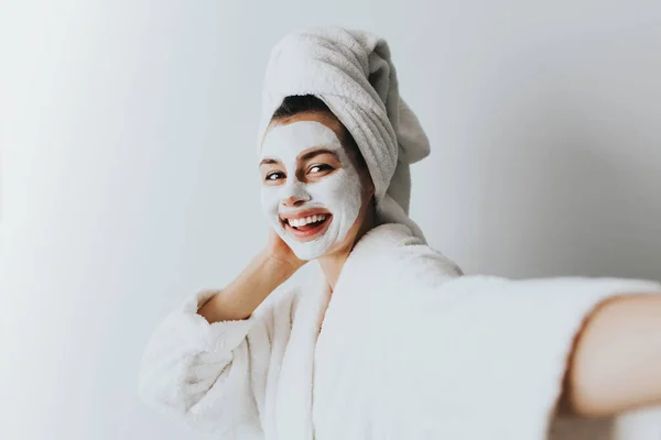 Woman Clay Mask Taking Selfie Mobile Phone Home Enjoying Relaxation Stock Image