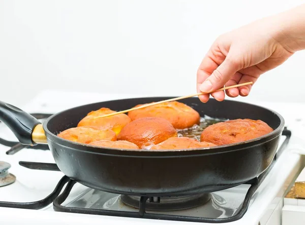 stock image Donuts frying in deep fat