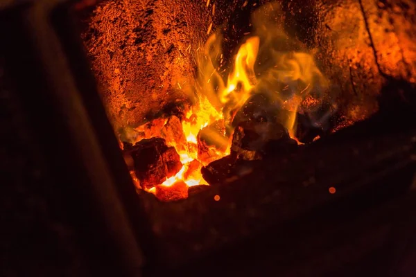 Fire in fireplace. Close up of red fire in stove — Stock Photo, Image