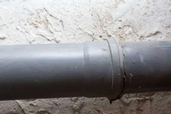 Sewer pipes in home basement — Stock Photo, Image