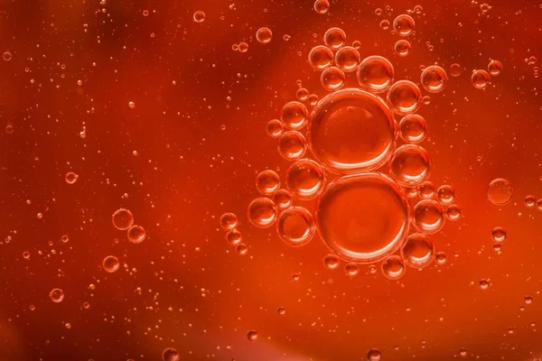 Oil droplets on water surface — Stock Photo, Image