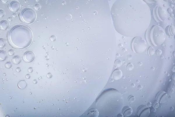 Oil droplets on water surface — Stock Photo, Image