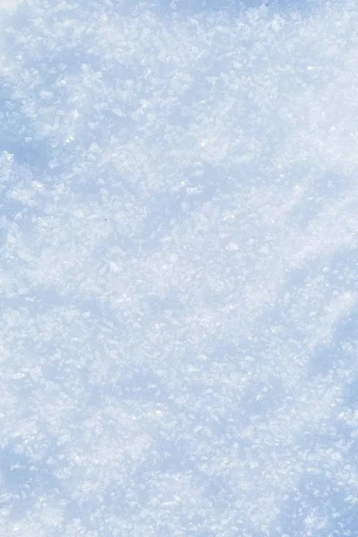 Снежный фон вблизи — стоковое фото