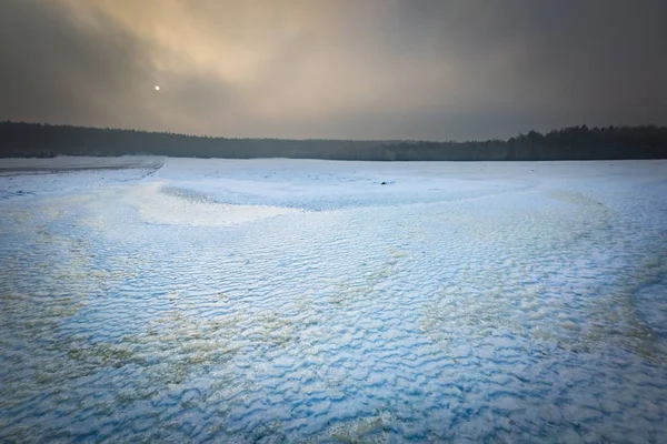Frozen water reservoir on fields. Winter landscape. — Stock Photo, Image