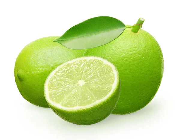 Whole fresh lime fruit with green leaf, lying and half — Stock Photo, Image