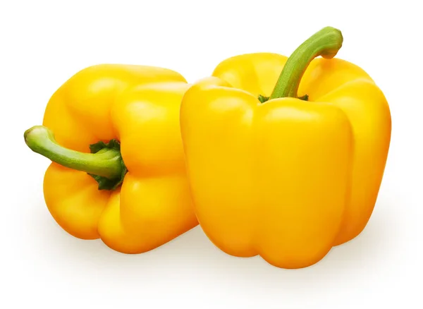 Whole fresh yellow bell pepper next to lying on side — Stock Photo, Image