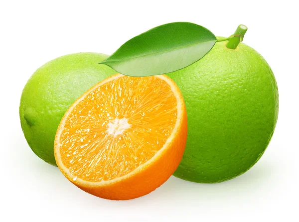 Fruta de limão com folha verde, deitado e metade de laranja — Fotografia de Stock