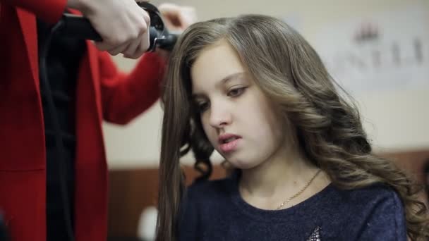 Hairdresser Makes The Final Stage Of Creating A Hairstyle For A