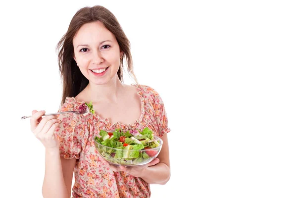 Felice giovane donna mangiare insalata. — Foto Stock