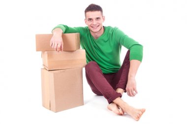 Surprised deliveryman hardly carries the parcel, isolated, white background clipart