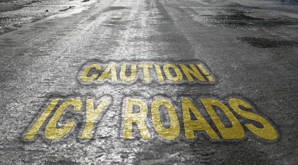Icy road. Selective focus. Danger concept ice-crusted ground. With the inscription \