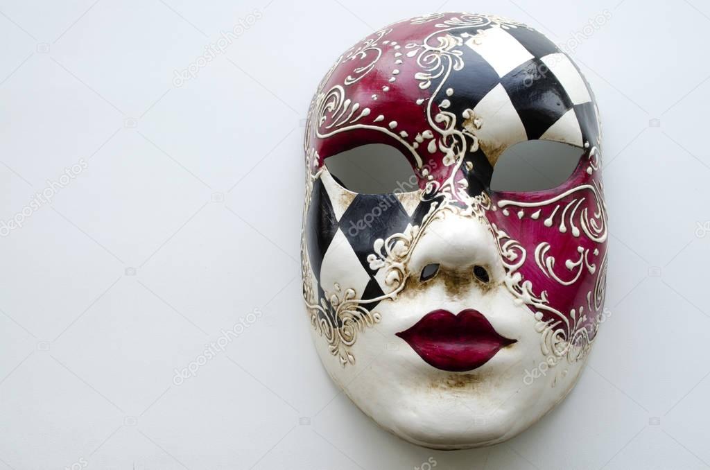 red black and white Venetian mask