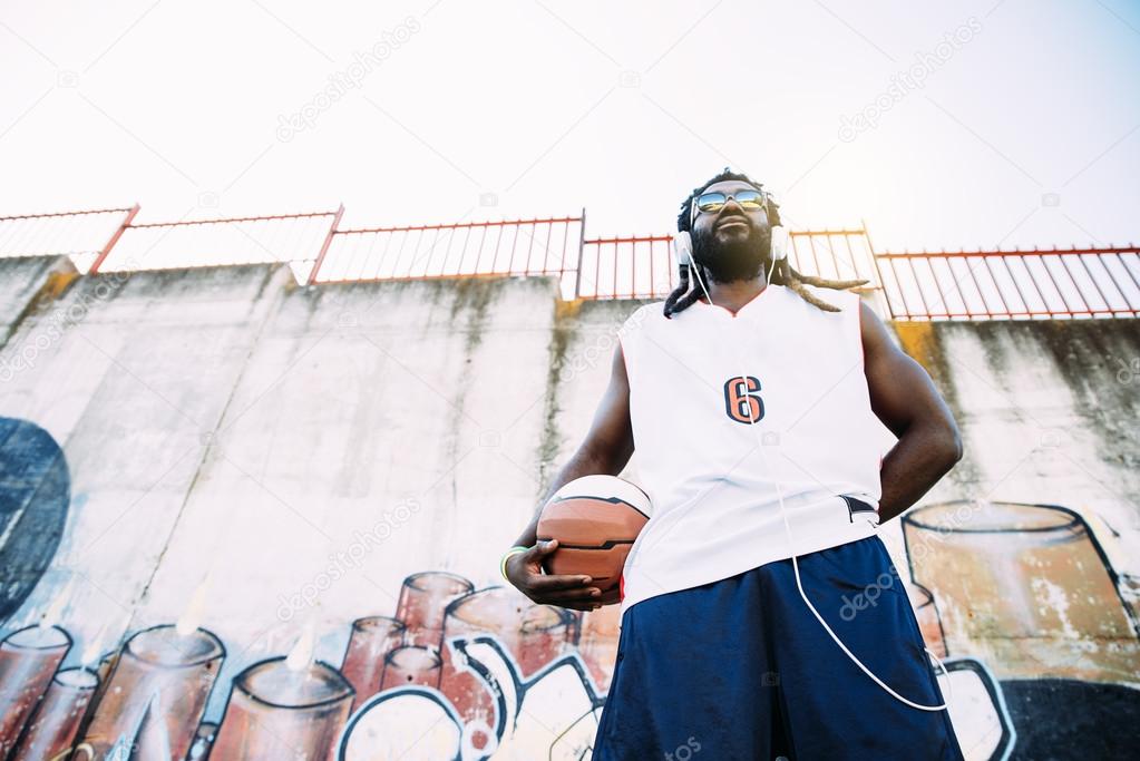 Portrait of Black Man with basket ball.