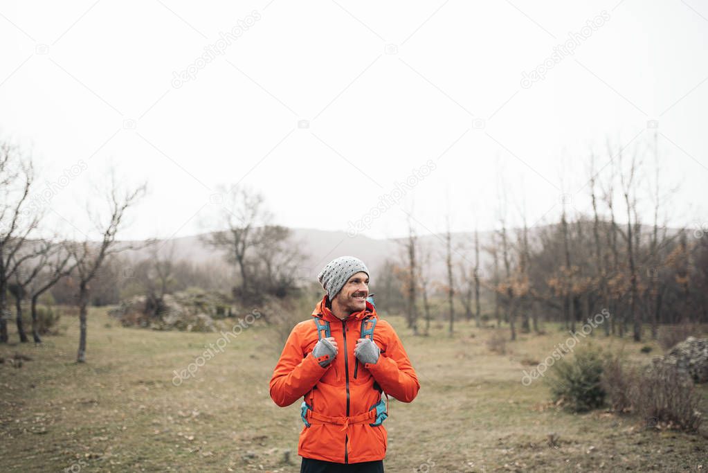 Young Backpacker enjoying of Nature.