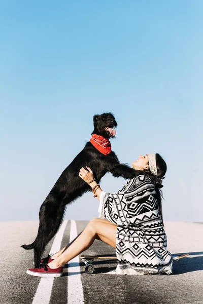 Beautiful young loving her dog. — Stock Photo, Image