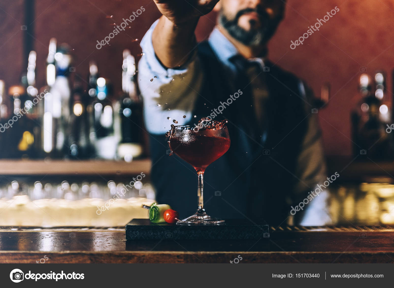 Barman is making cocktail at night club. - a Royalty Free Stock Photo from  Photocase