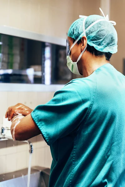 Doctor Washing Hands Before Operating.