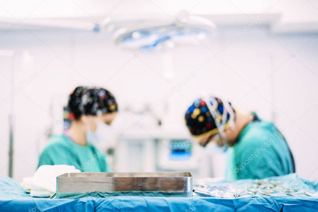 Team of Surgeons Operating in the Hospital.