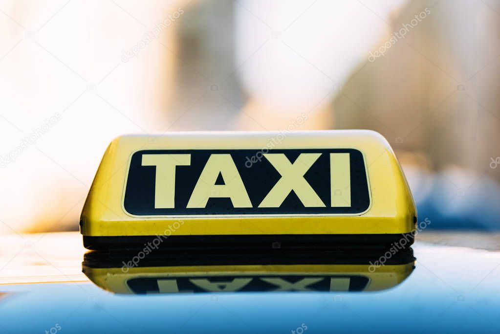 Close up of a taxi roof sign in Vienna.