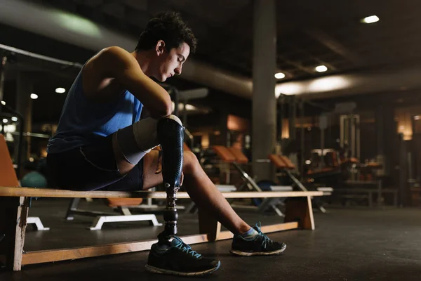 Portrait of disabled young in the gym.