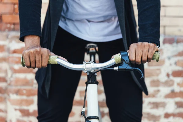 Handsome afro man riding a bike. — Stock Photo, Image