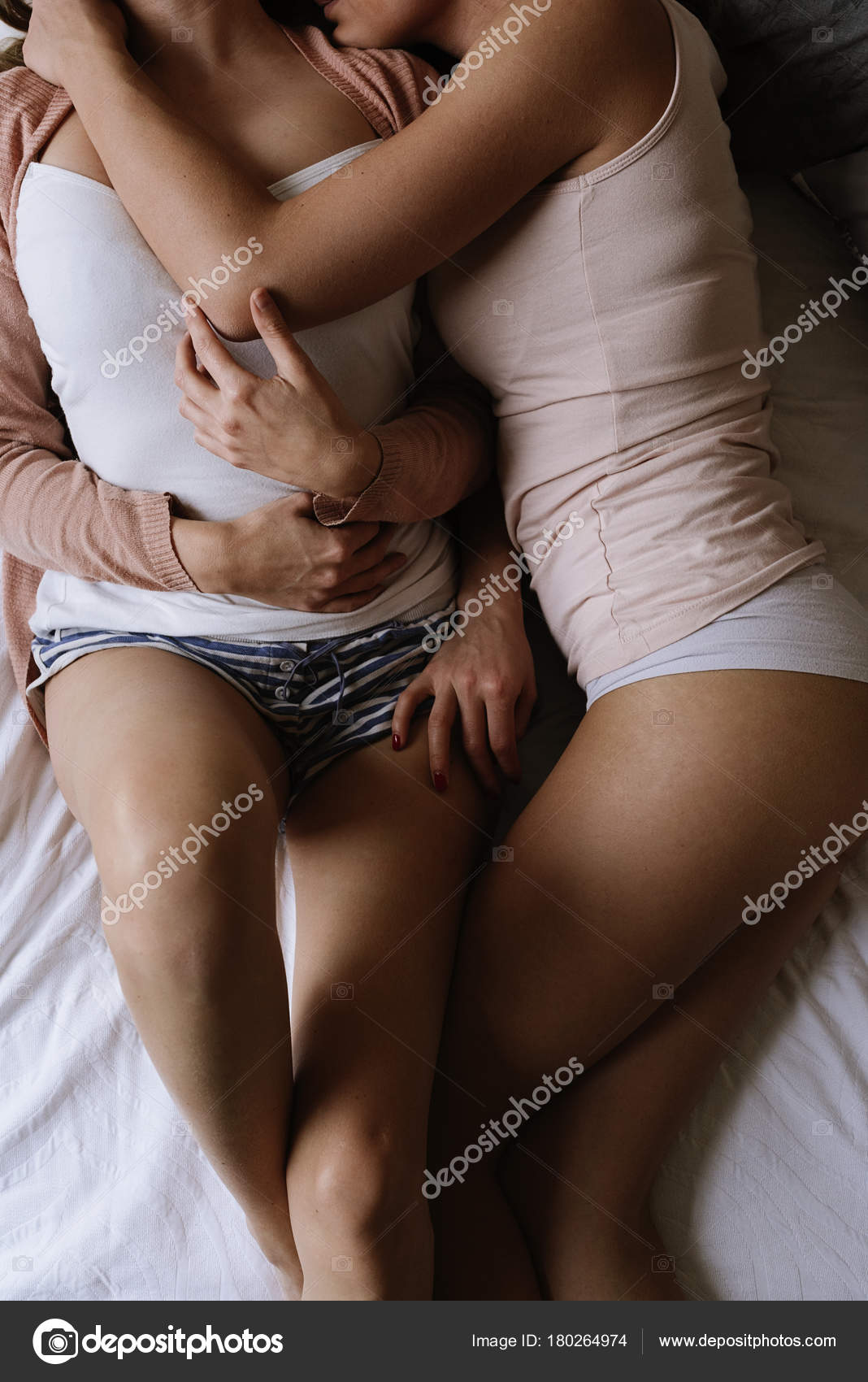A gay couple in bed having sex Stockfotos, lizenzfreie A gay couple in bed having sex Bilder Depositphotos