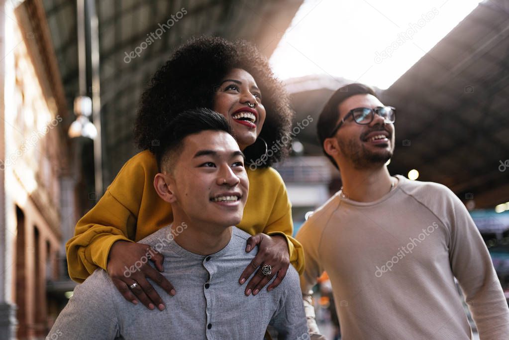 Group of happy having fun in the street.