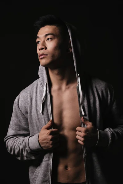 Porträt eines jungen asiatischen Jungen mit Sportbekleidung. — Stockfoto