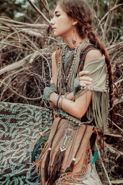boho woman close up portrait with roots background